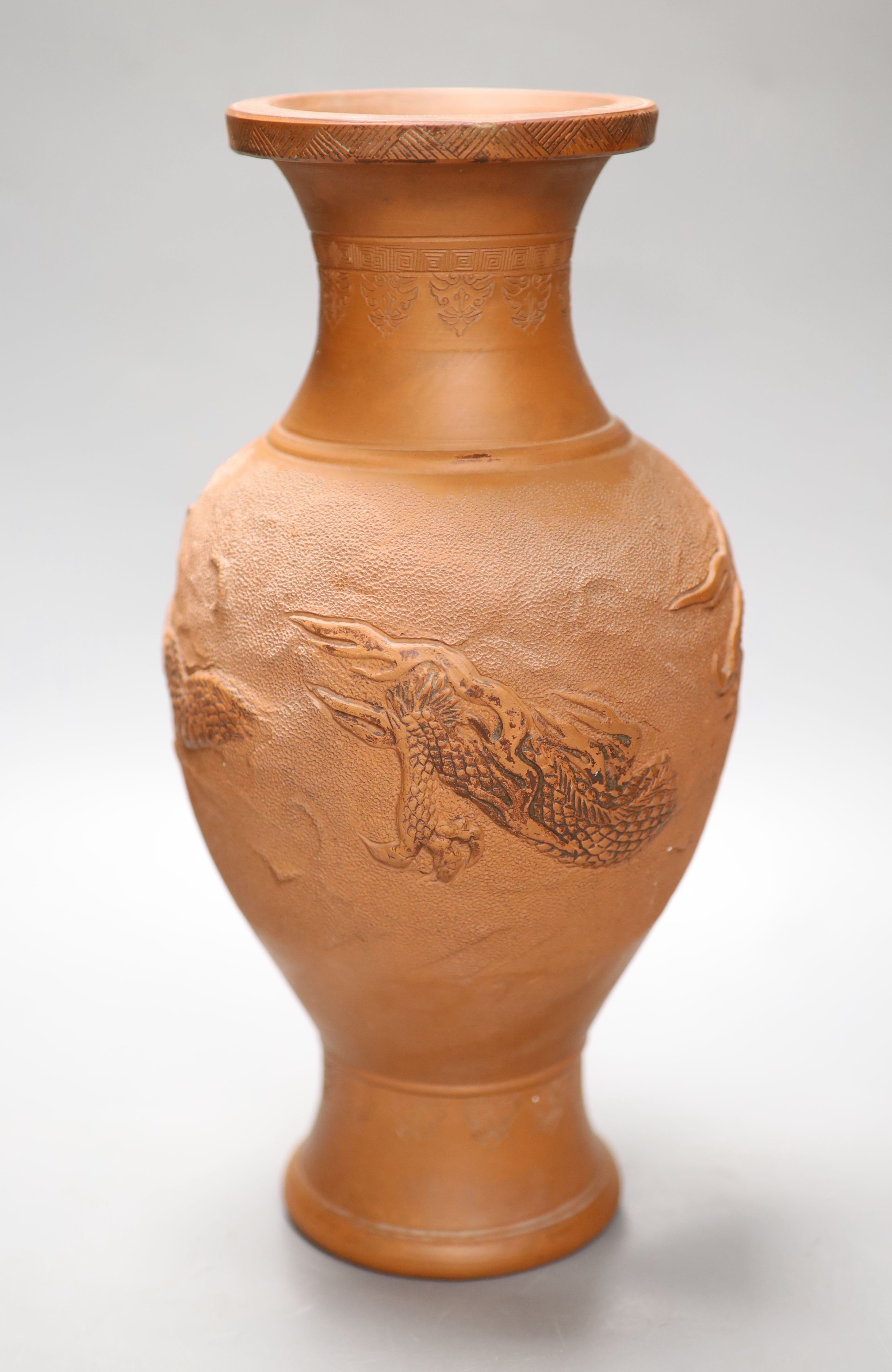 A Chinese terracotta dragon vase, height 31cm